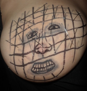 Illustration for article titled And now, for reasons inexplicable, breasts cosplaying as Freddy Krueger and Pinhead (NSFW)